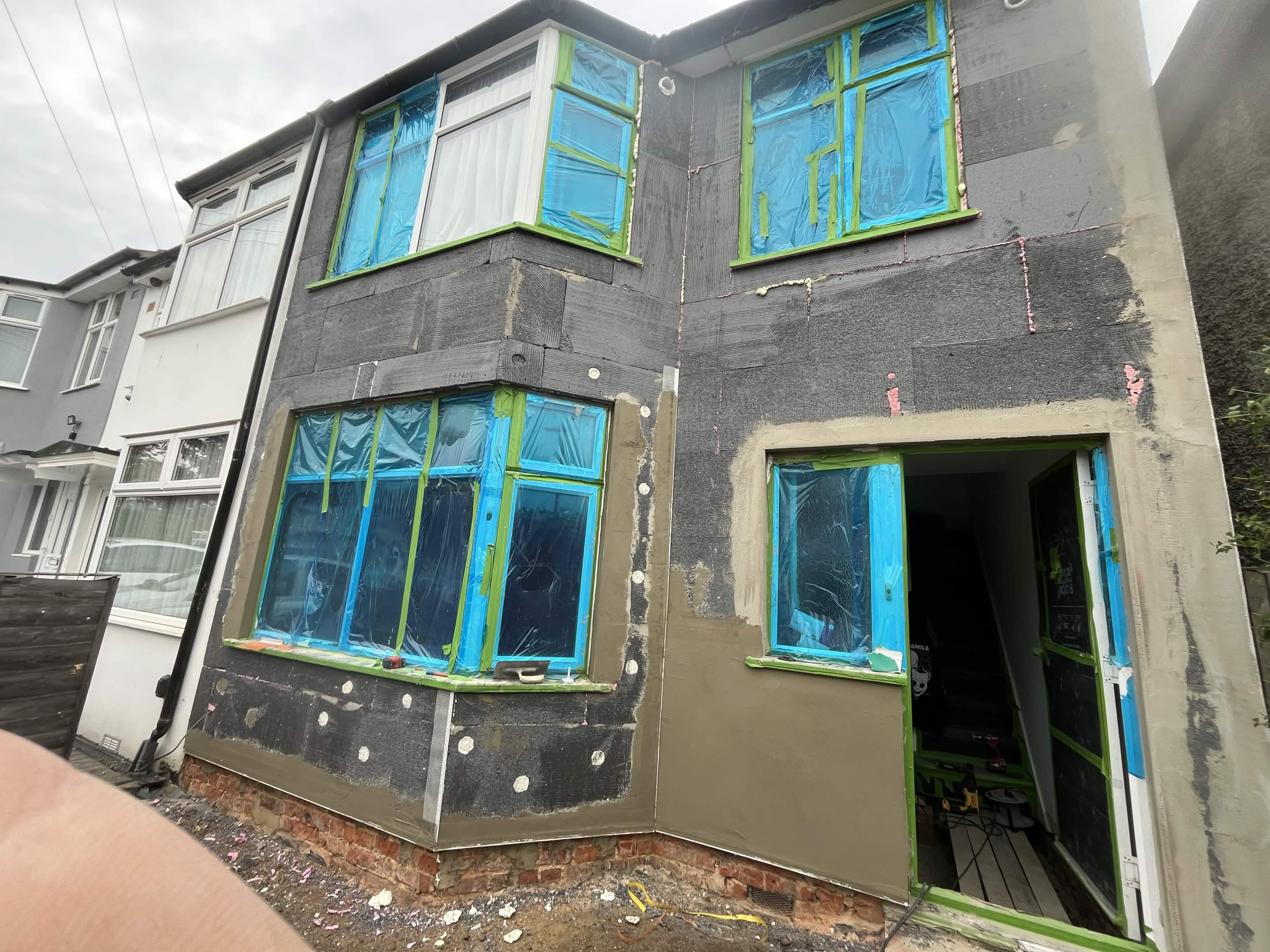 House No. 1 front elevation prepared for EPS insulation