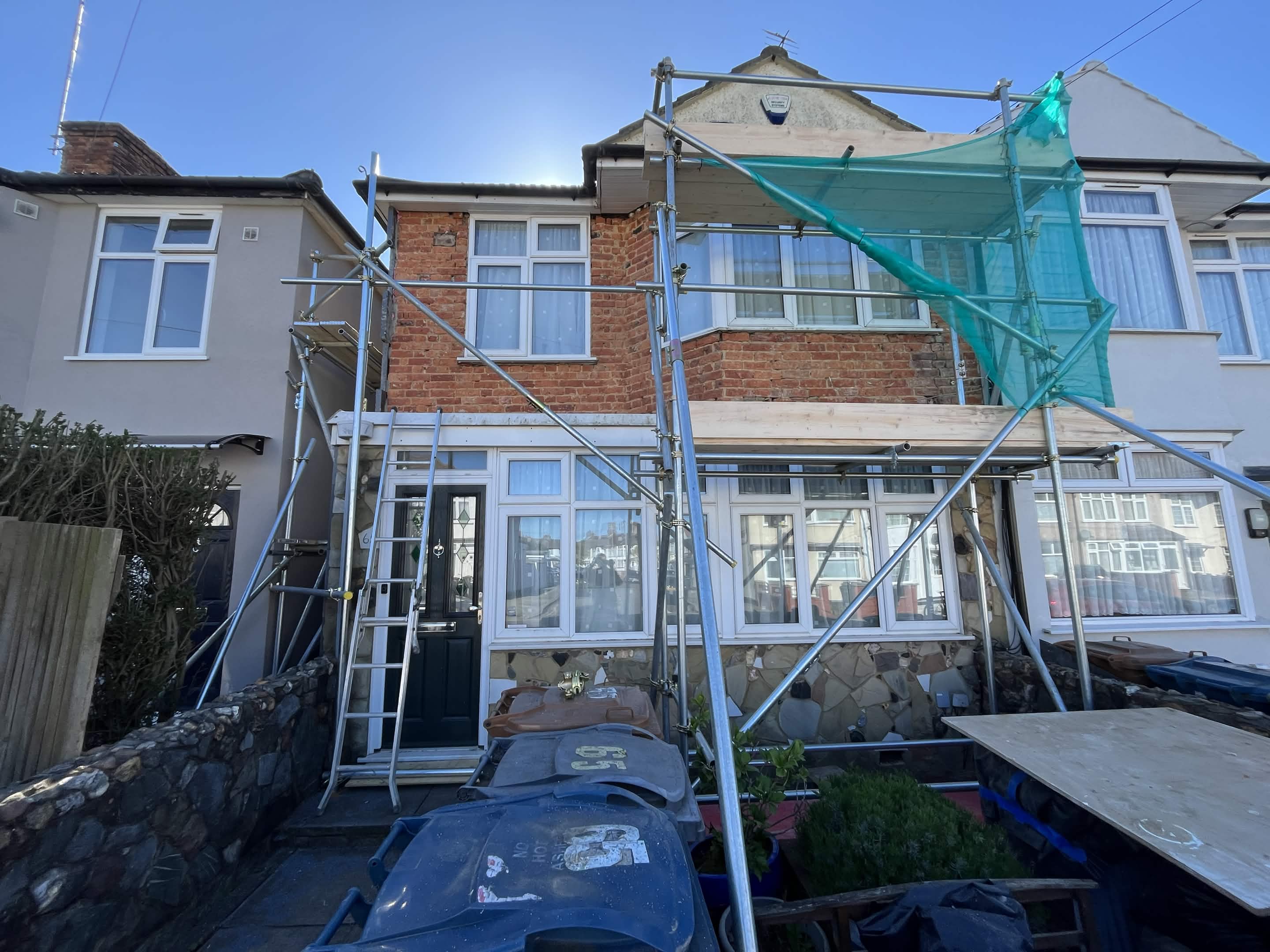 House No. 2 preparation stage with scaffolding
